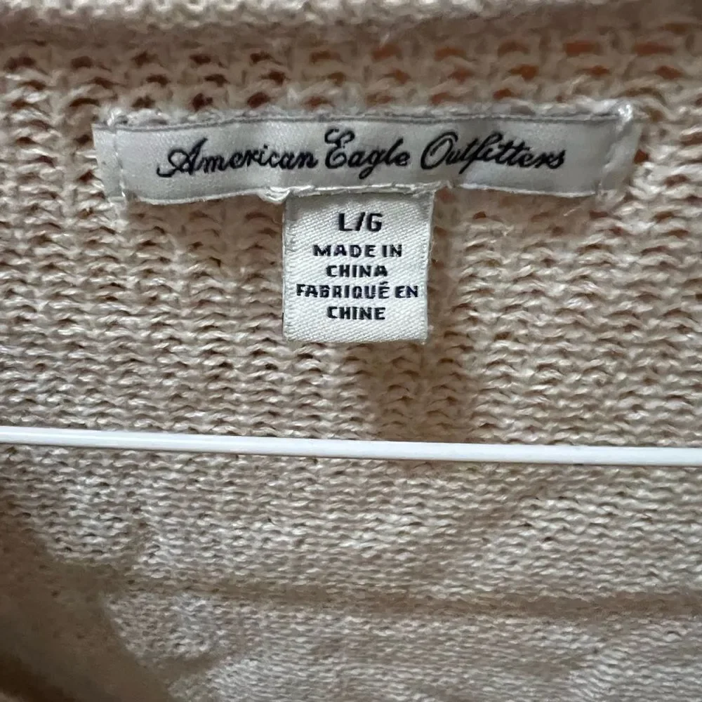 American Eagle zip up cream colored sweater size large